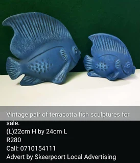 Vintage pair of terracotta fish sculptures for sale
