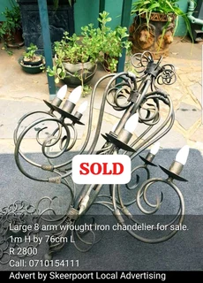 Large 8 arm wrought iron chandelier for sale.