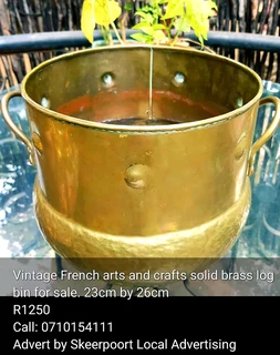 Vintage French arts and crafts solid brass log bin for sale.