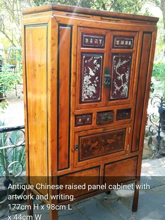 Antique Large Chinese Raised Panel Cabinet With Artwork And Writing For Sale.