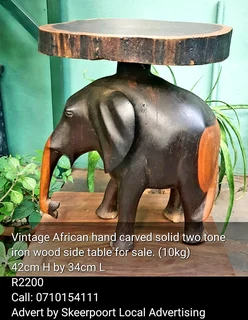 Vintage African hand carved solid 10kg two tone iron wood side table for sale.