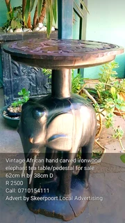 Vintage African hand carved solid 10kg two tone iron wood side table for sale.