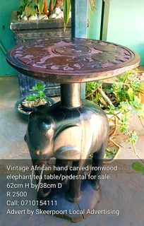 Vintage African hand carved solid 10kg two tone iron wood side table for sale.