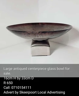 Large antiqued centerpiece glass bowl for sale.
