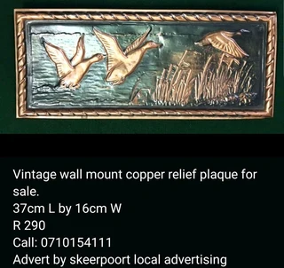 Vintage wall mount copper relief plaque for sale.