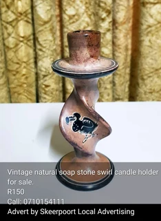 Vintage natural soap stone swirl candle holder for sale.