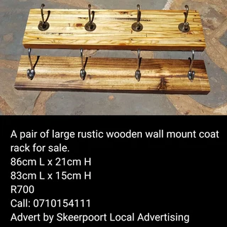 A pair of large rustic wooden wall mount coat rack for sale.