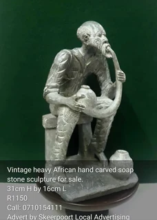 Vintage heavy carved African stone sculpture for sale