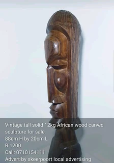 Vintage tall 12kg African wood carved sculpture for sale.