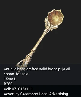 Antique hand crafted solid brass puja oil spoon for sale.