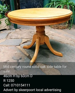 Mid century round solid oak side table for sale