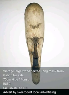 Vintage large carved Fang mask for sale.