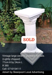 Vintage large ceramic pesdestal for sale.