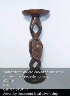 Vintage large African carved double sided wooden mask pedestals for sale
