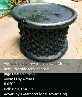 Vintage single tree trunk African Bamileke side table for sale.