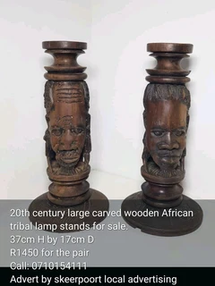 20th century large carved wooden African tribal lamp stands for sale.