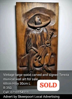 Vintage large wood carved and signed Tereza musical wall art for sale.