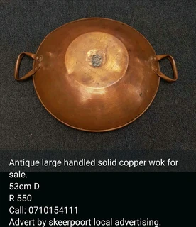 Antique large handled solid copper wok for sale.