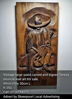 Signed wooden wall panels for sale.