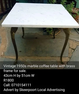 Vintage 1950s marble coffee table with brass frame for sale.