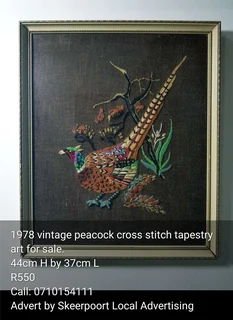 1978 vintage peacock cross stitched tapestry art for sale.