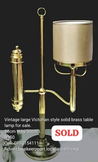 Vintage large Victorian style solid brass table lamp for sale.