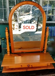 Vintage large wooden tabel top vanity swivel  mirror with two drawer base for sale.