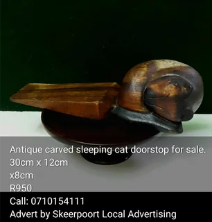 Antique carved sleeping cat doorstop for sale