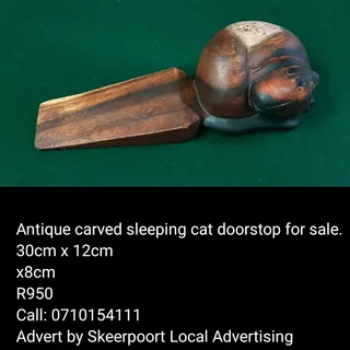 Antique carved sleeping cat doorstop for sale