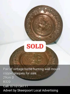 Vintage pair of horse hunting wall mount copper plaques for sale.