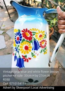 Vintage large blue and white floral design pitcher for sale