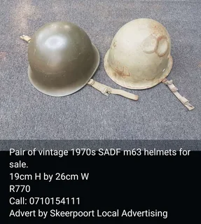 Pair Of Vintage 1979s Sandf M63 Helmets For Sale.
