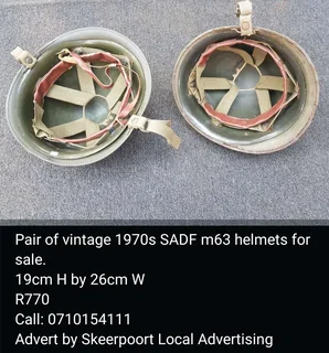 Pair of vintage 1979s SANDF m63 helmets for sale.