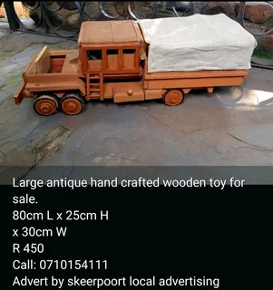 Large antique hand crafted wooden toy for sale.