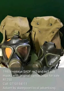 1980s vintage SADF no2 and no3 gas masks with original canvas bags for sale.