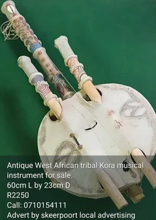Antique West African tribal Kora musical instrument for sale.