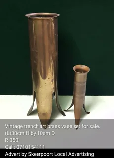 Vintage trench art vases for sale.