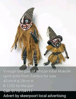 Vintage rare pair of African tribal Makishi spirit dolls for sale.