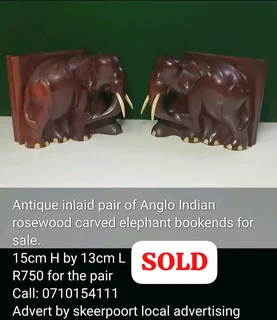 Antique inlaid pair of Anglo Indian rosewood carved elephant bookends for sale
