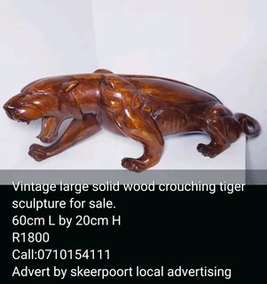 Vintage large solid wood crouching tiger sculpture for sale