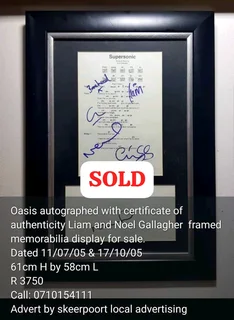 Oasis rock band autographed framed memorabilia display for sale.