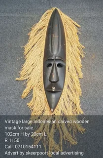 Vintage large Indonesian carved wooden mask for sale