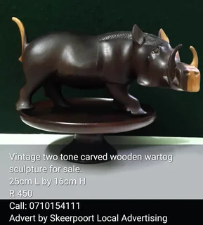 Vintage wooden two tone carved warthog sculpture for sale