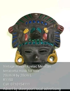 Vintage Mayan Azetec Mexican terracotta mask for sale.