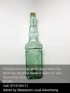 Vintage extra large green glass brass top beverage decanter made in Spain for sale