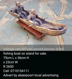 Vintage rare African carved wooden tribal fishing boat on stand for sale