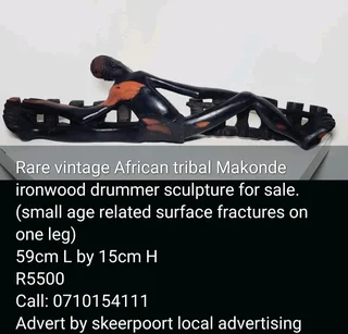 Rare vintage African tribal Makhonde ironwood drummer sculpture for sale