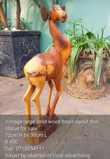 Vintage large solid wood brass eared deer statue for sale