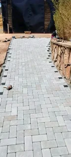 Artificial grass and paving.