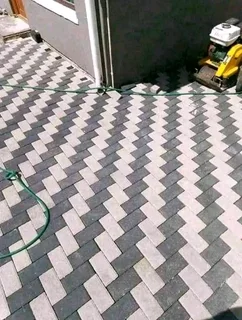 Artificial grass and paving.